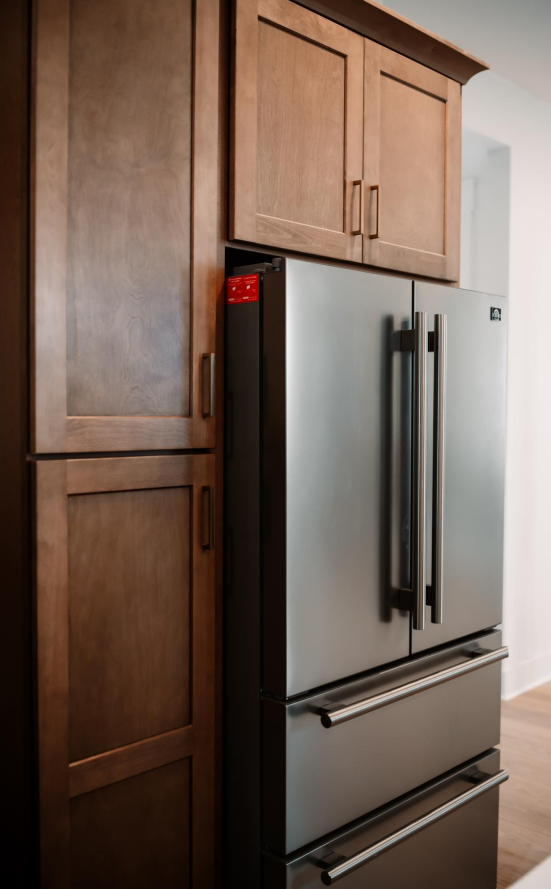 Built-in refrigerator with custom wood cabinetry
